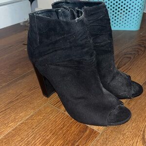 Woman’s Black 5 inch heeled booties size 11